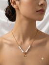 White Enamel Bead and Straw Charm Necklace