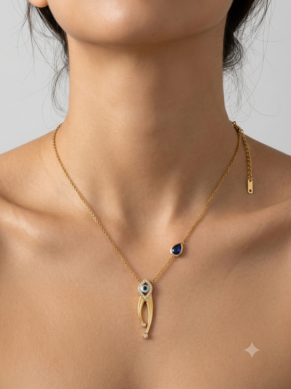 Lyra Evil Eye Necklace – Gold Abstract Tassel with Sapphire Blue Teardrop Charm